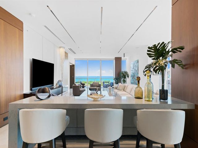 a bed room with bed and a large window