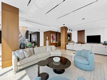 a workspace with furniture and a lamp