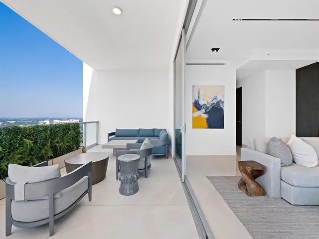 a front view of a building with lake view