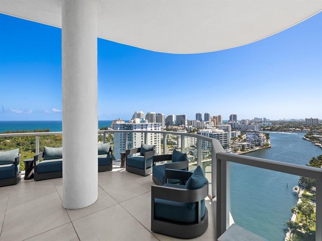 a view of a city with tall buildings in the background