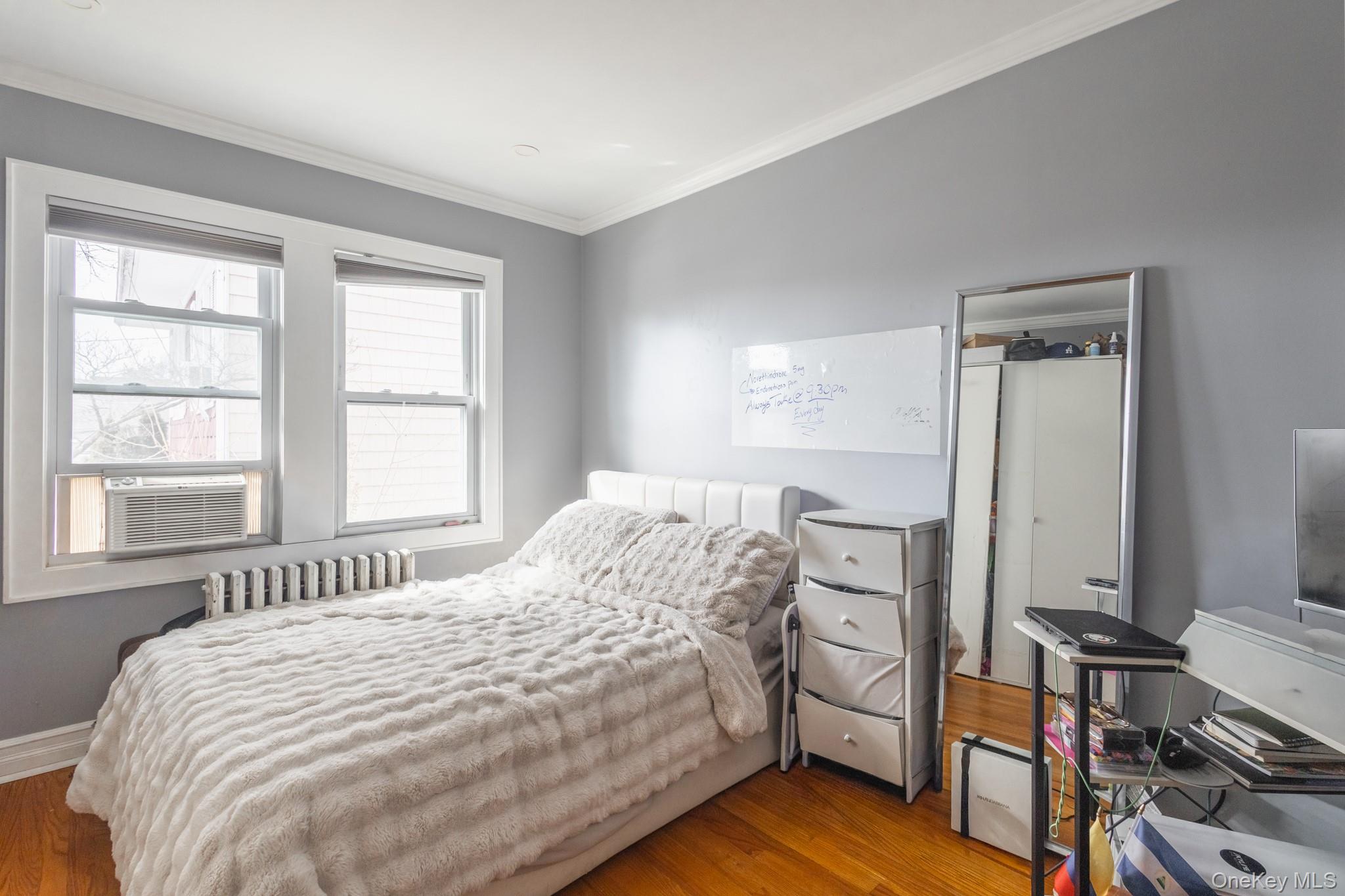 50 Acorn Terrace New Rochelle, NY 10801 - Photo 18 of 27 a bedroom with a bed and a window