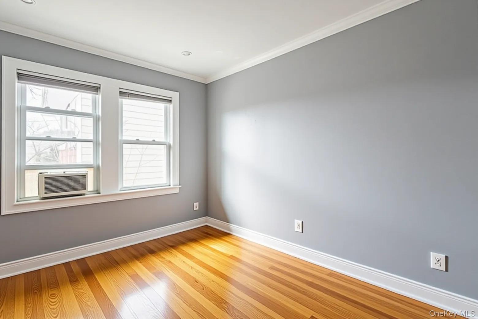 50 Acorn Terrace New Rochelle, NY 10801 - Photo 19 of 27 a view of a room with wooden floor and a window