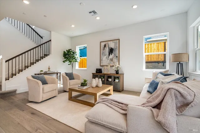 a bedroom with furniture and a window