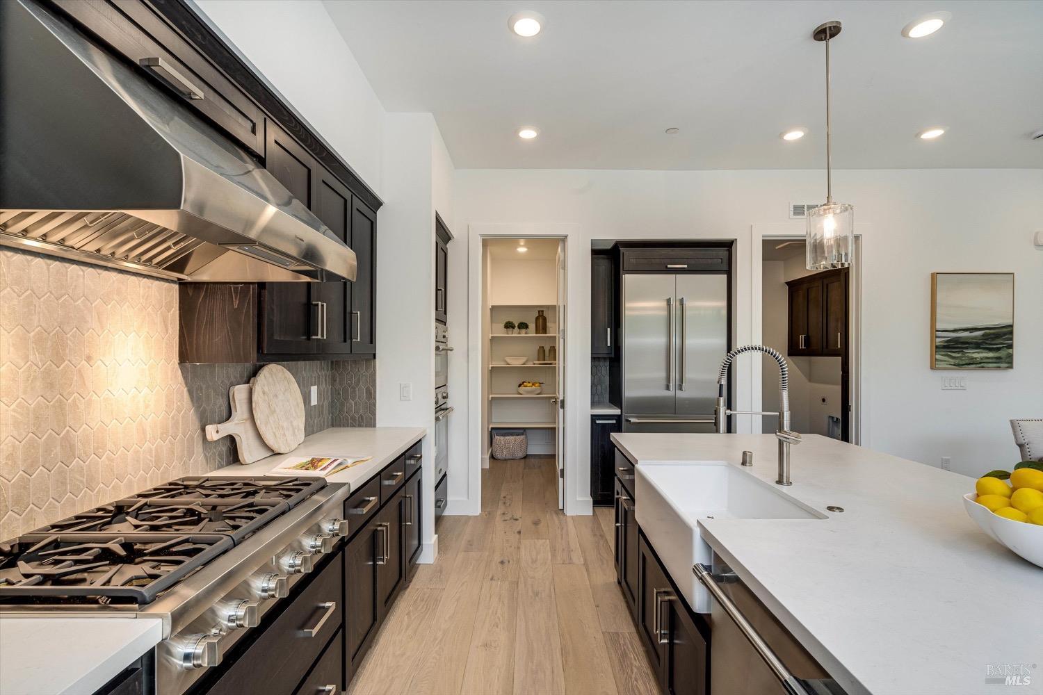 103 Grace Lane Napa, CA 94559 - Photo 19 of 39 a kitchen with a stove and a sink