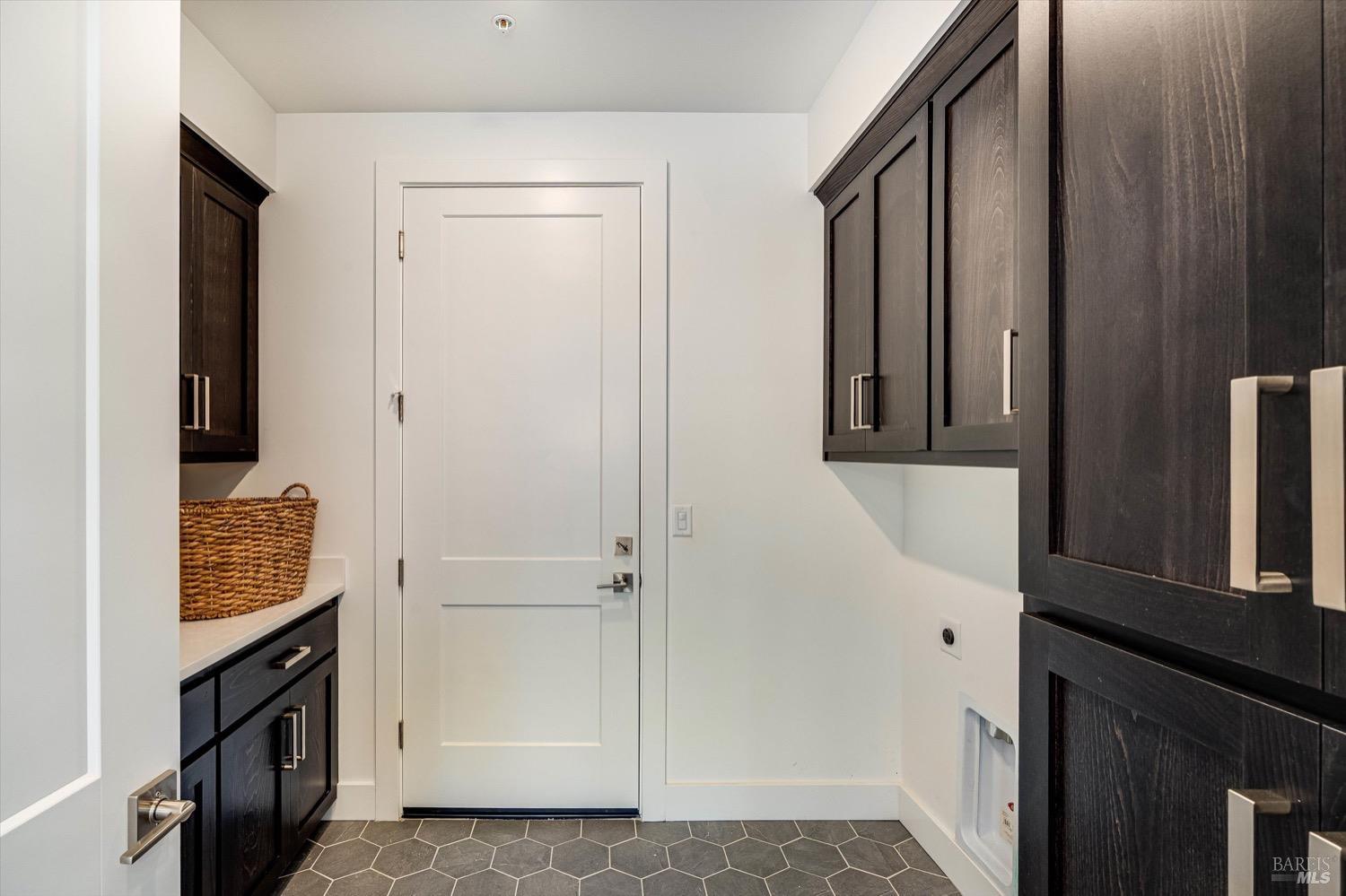 103 Grace Lane Napa, CA 94559 - Photo 21 of 39 a view of an entryway with wooden cabinet