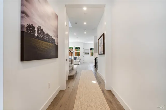 a view of a living room with a flat screen tv