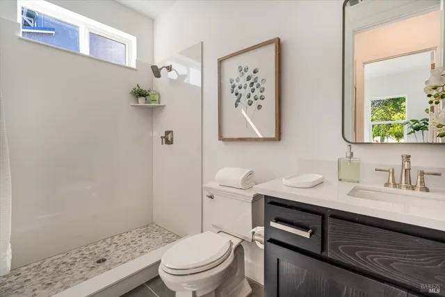 a bathroom with a sink and a toilet