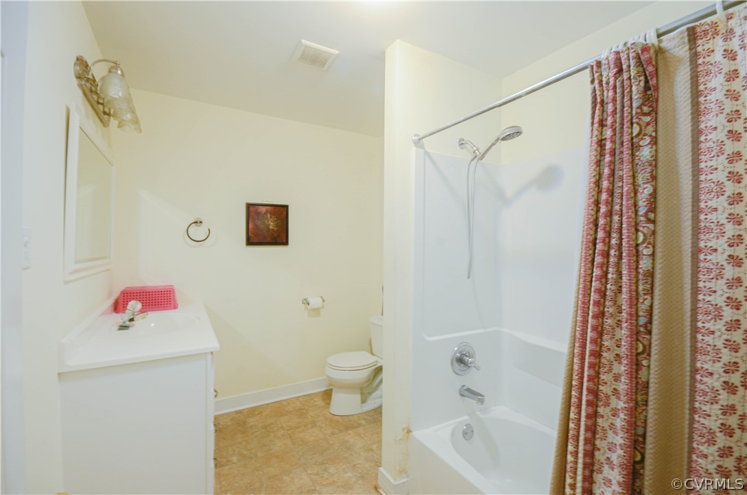 4100 Treely Road Chester, VA 23831 - Photo 20 of 29 a bathroom with a shower a bath tub and a sink