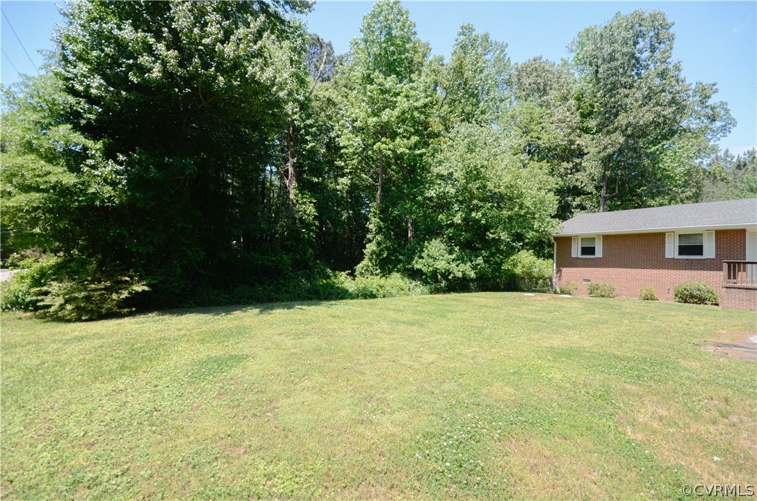 4100 Treely Road Chester, VA 23831 - Photo 28 of 29 a view of a house with a yard