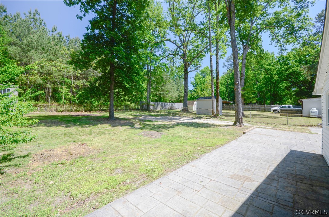 4100 Treely Road Chester, VA 23831 - Photo 6 of 29 a swimming pool with outdoor seating and yard
