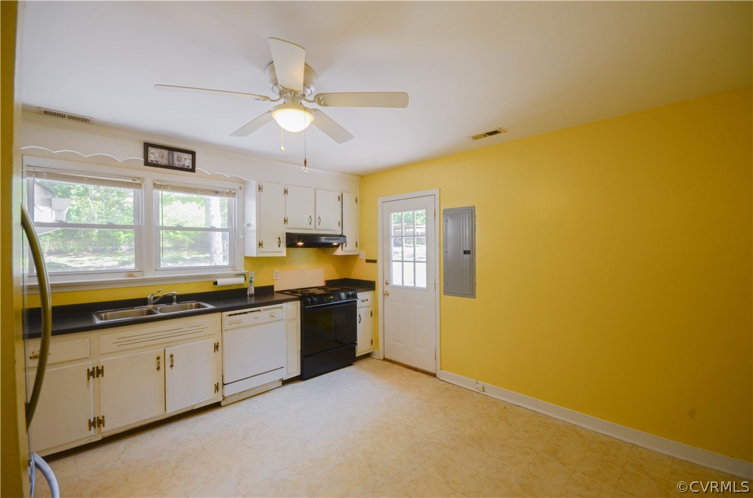 4100 Treely Road Chester, VA 23831 - Photo 10 of 29 a large kitchen with stainless steel appliances granite countertop a stove a sink and a window