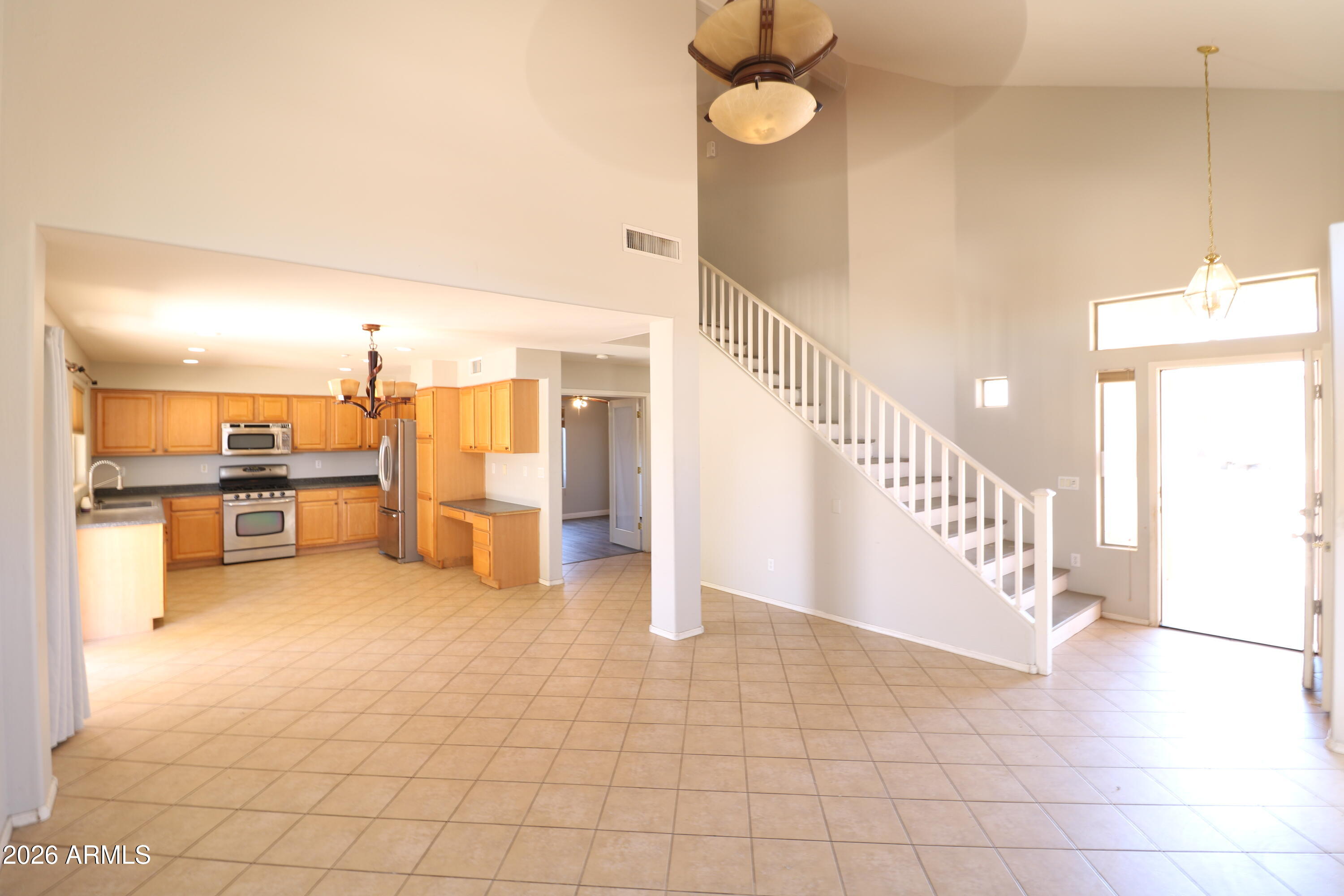 17059 West Northampton Road Surprise, AZ 85374 - Photo 2 of 21 Living room & kitchen