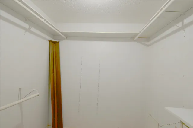 a bathroom with a sink double vanity and a mirror