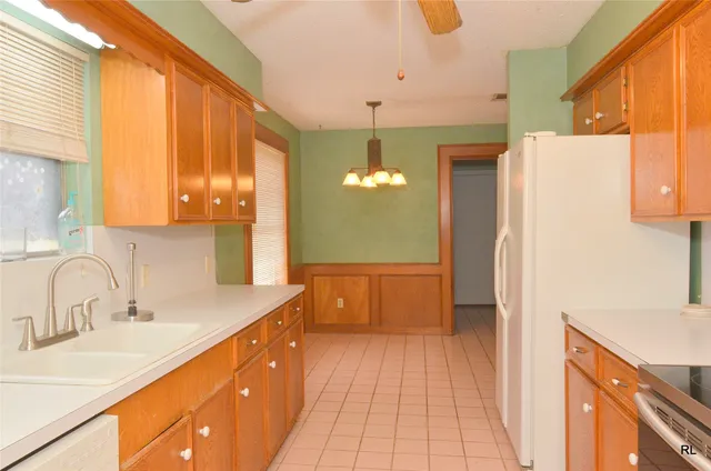 a view of a yard with a tree