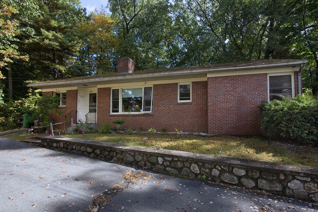 151 West Allen Ridge Road Springfield, MA 01118 - Photo 2 of 30 a view of a house with a yard