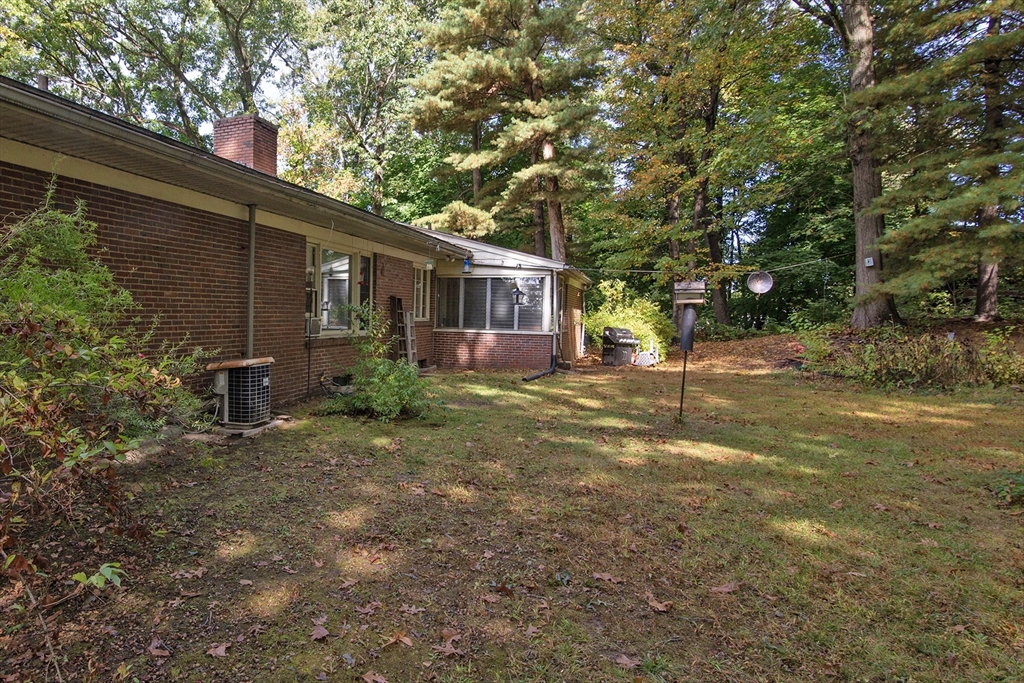 151 West Allen Ridge Road Springfield, MA 01118 - Photo 5 of 30 a view of a house with a yard
