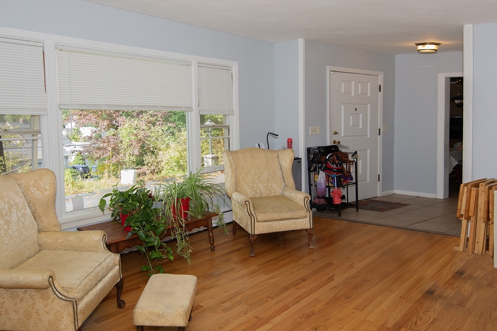 151 West Allen Ridge Road Springfield, MA 01118 - Photo 9 of 30 a living room with furniture and a large window