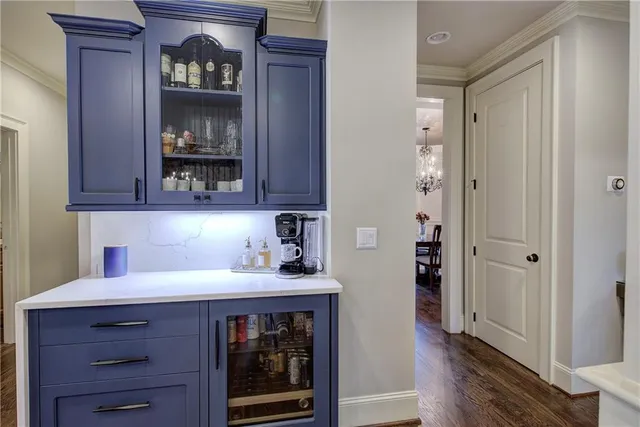 a bathroom with a granite countertop sink a vanity and a mirror