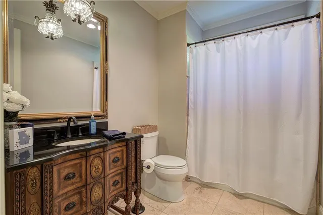a living room with furniture and a glass door