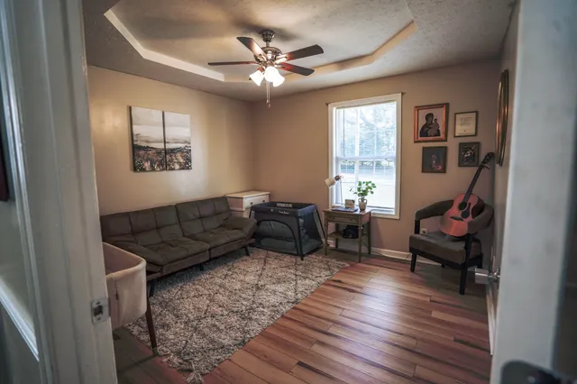 a living room with furniture and a window