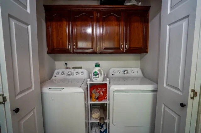 a utility room with dryer and washer