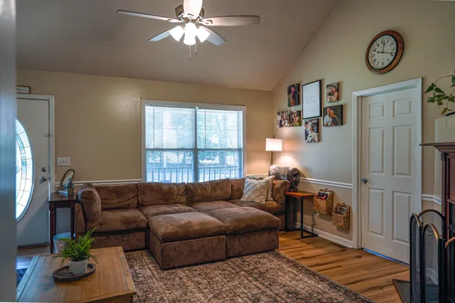 a living room with furniture and a window
