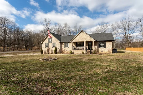 a view of balcony with furniture