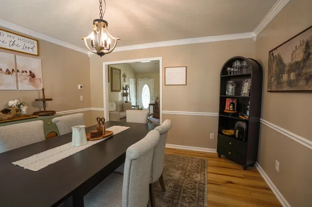 a room with furniture and wooden floor