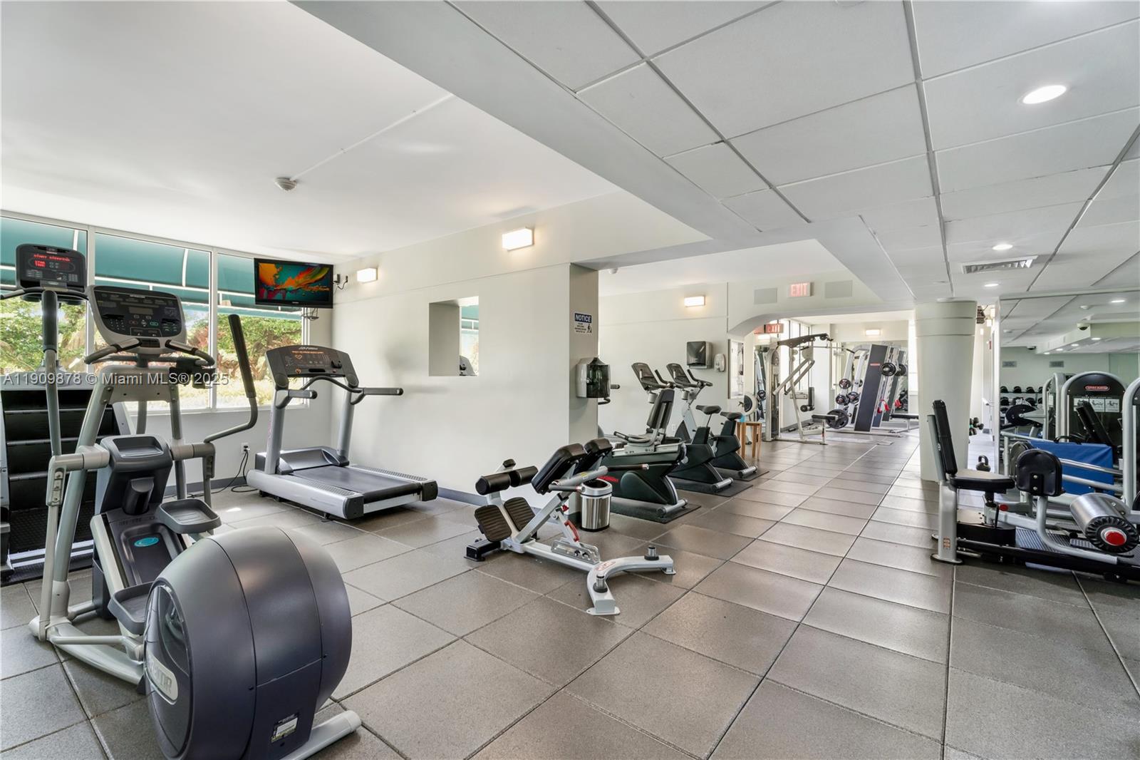 888 Brickell Key Drive, Unit 2610 Miami, FL 33131 - Photo 33 of 37 a view of a room with gym equipment