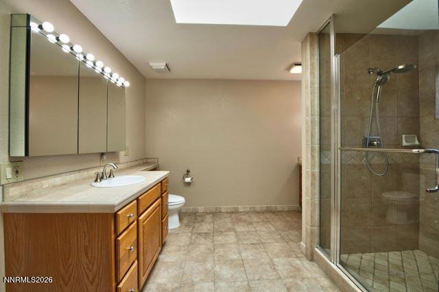 2640 Rockview Drive Reno, NV 89519 - Photo 37 of 56 a bathroom with a sink a toilet and shower