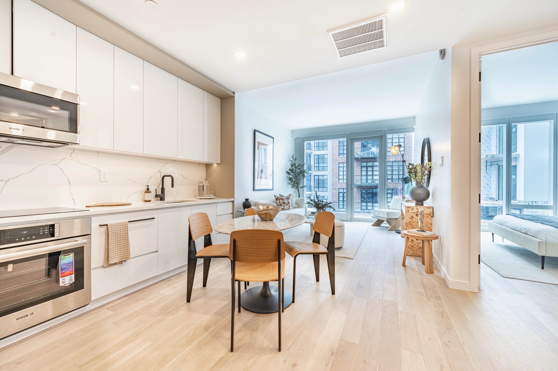 37-34 33rd Street, Unit 6B Queens, NY 11101 - Photo 2 of 11 a view of a kitchen and dining room