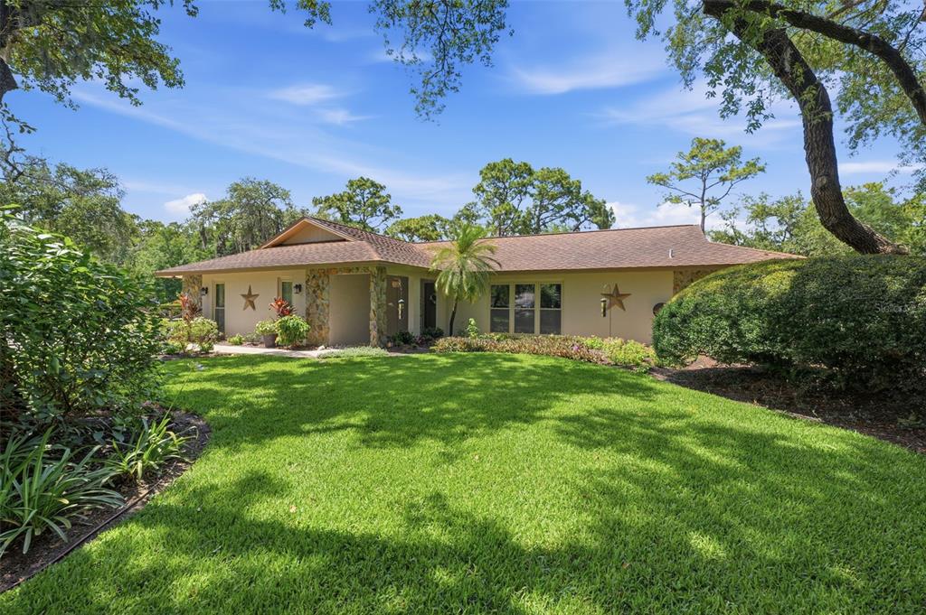 6403 Chiswick Court New Port Richey, FL 34655 - Photo 5 of 86