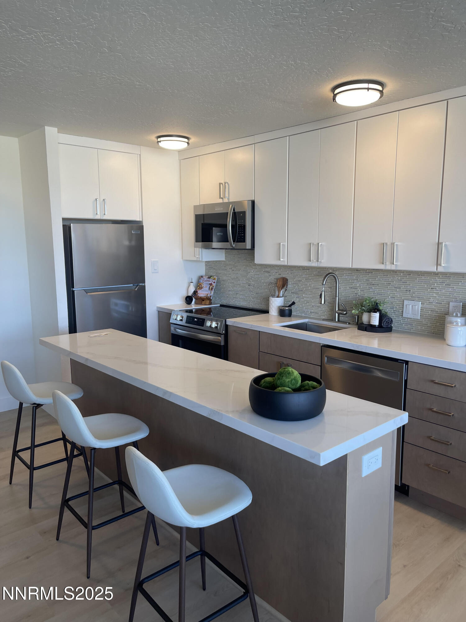 100 North Arlington Avenue, Unit 6G Reno, NV 89501 - Photo 11 of 25 Kitchen with Fridge