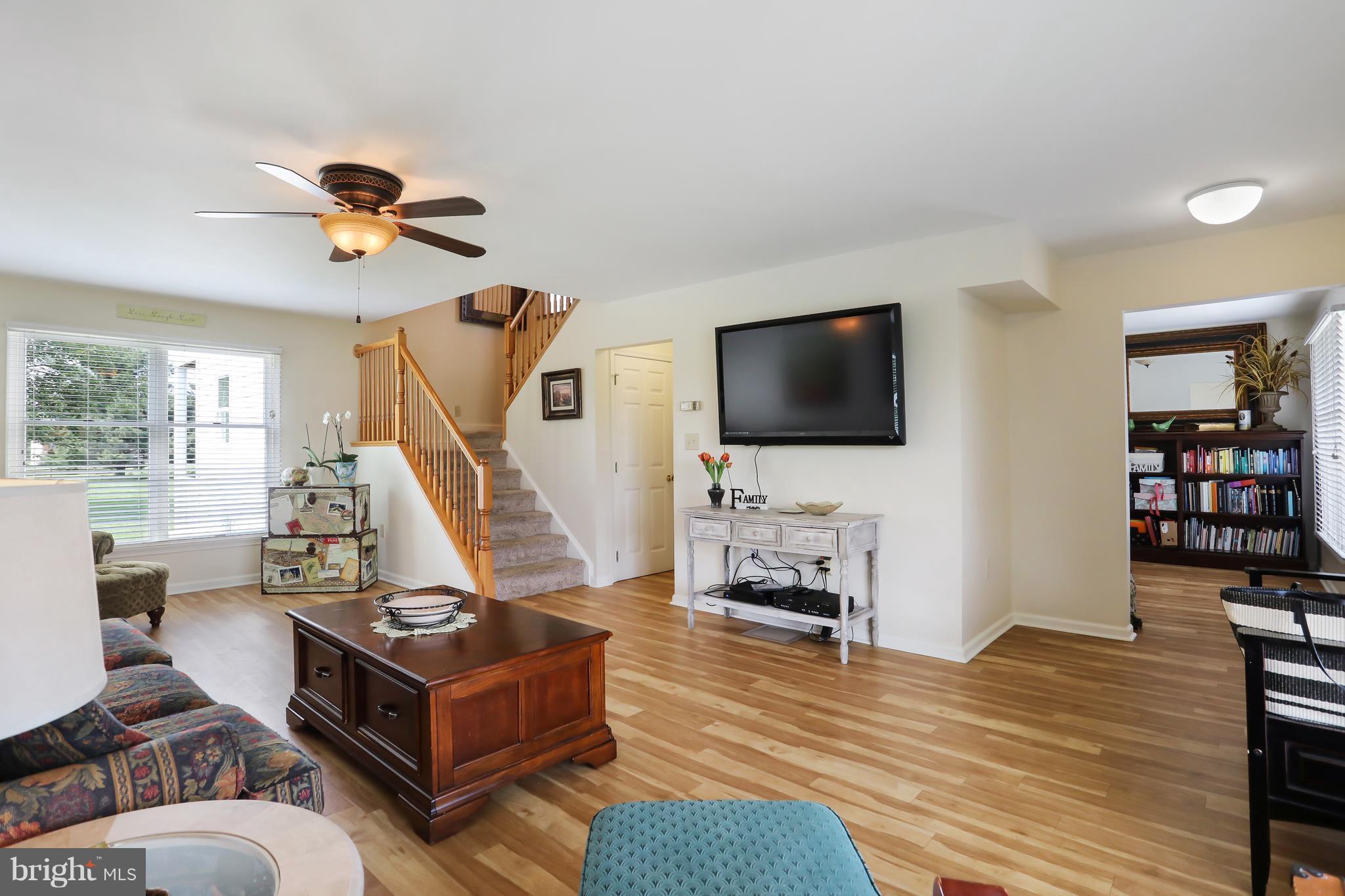 13816 Big Pool Road Clear Spring, MD 21722 - Photo 2 of 24 a living room with furniture and a flat screen tv