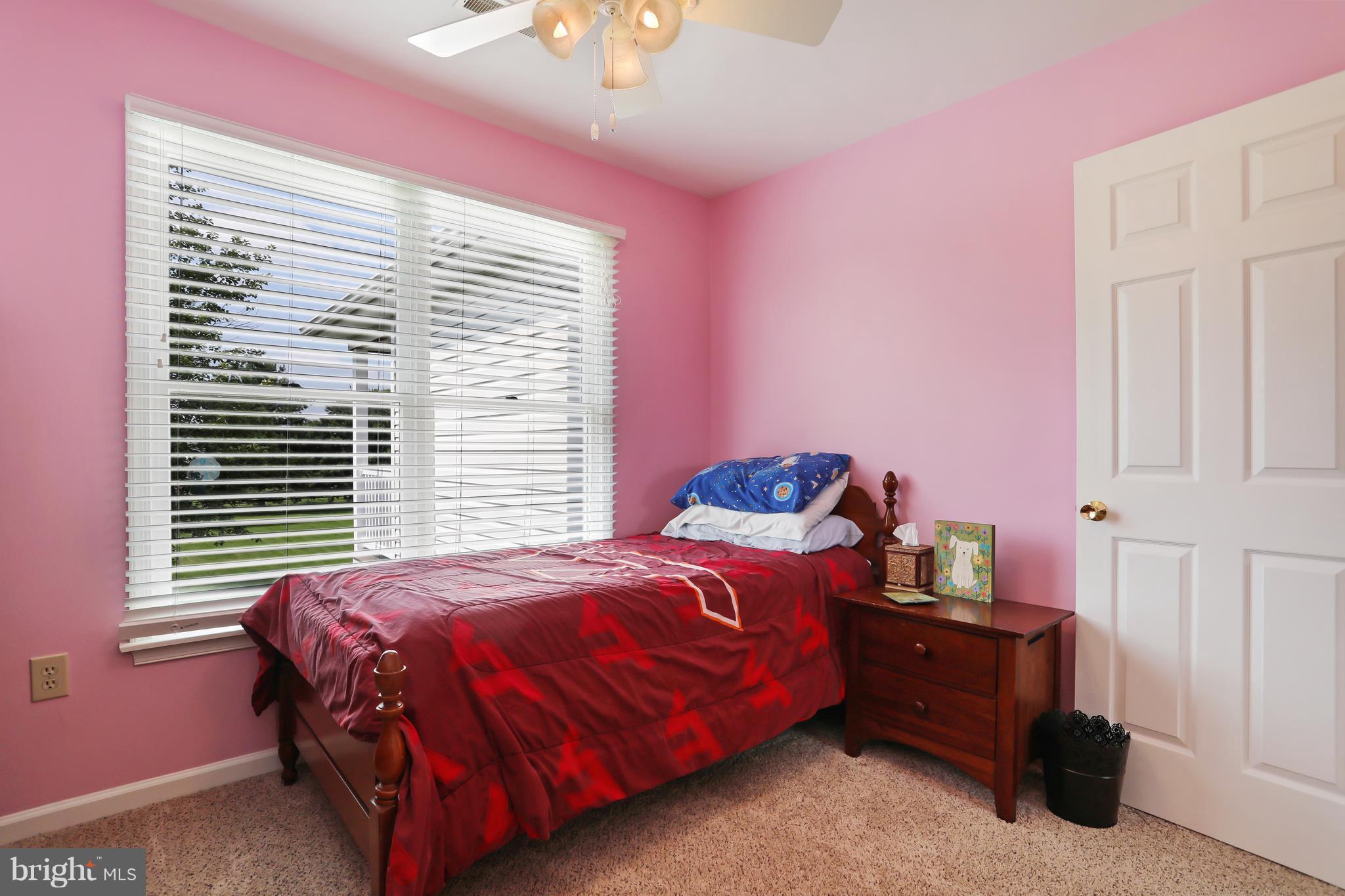 13816 Big Pool Road Clear Spring, MD 21722 - Photo 15 of 24 a bedroom with a bed and a window