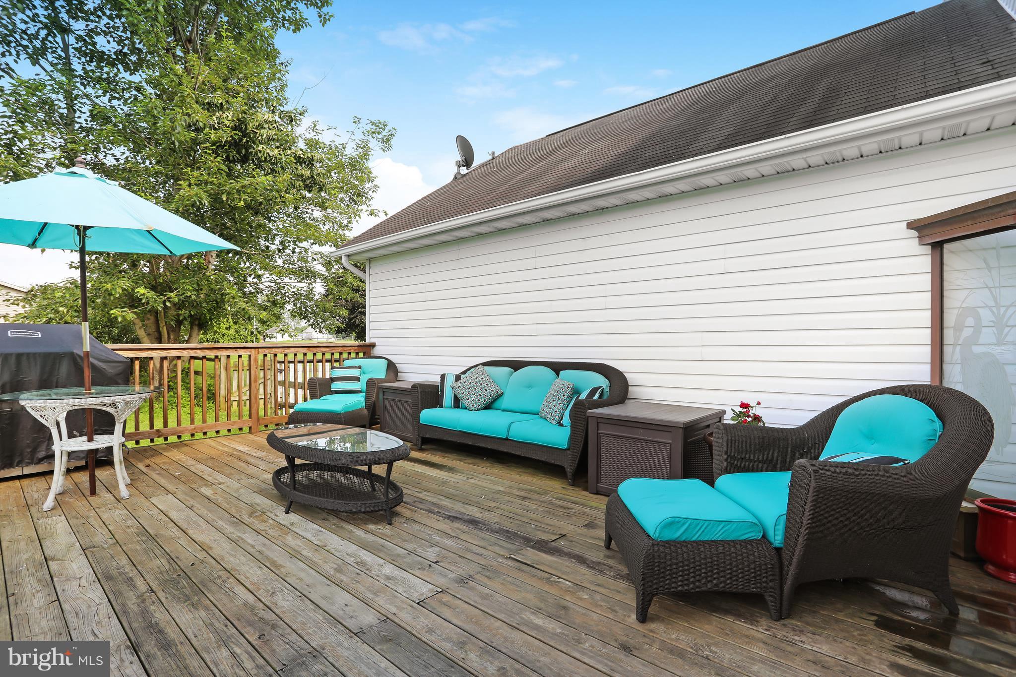 13816 Big Pool Road Clear Spring, MD 21722 - Photo 24 of 24 a roof deck with table and chairs
