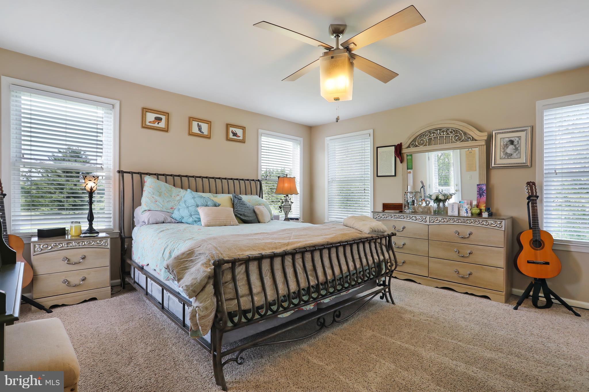 13816 Big Pool Road Clear Spring, MD 21722 - Photo 8 of 24 a bed room with a bed and a window
