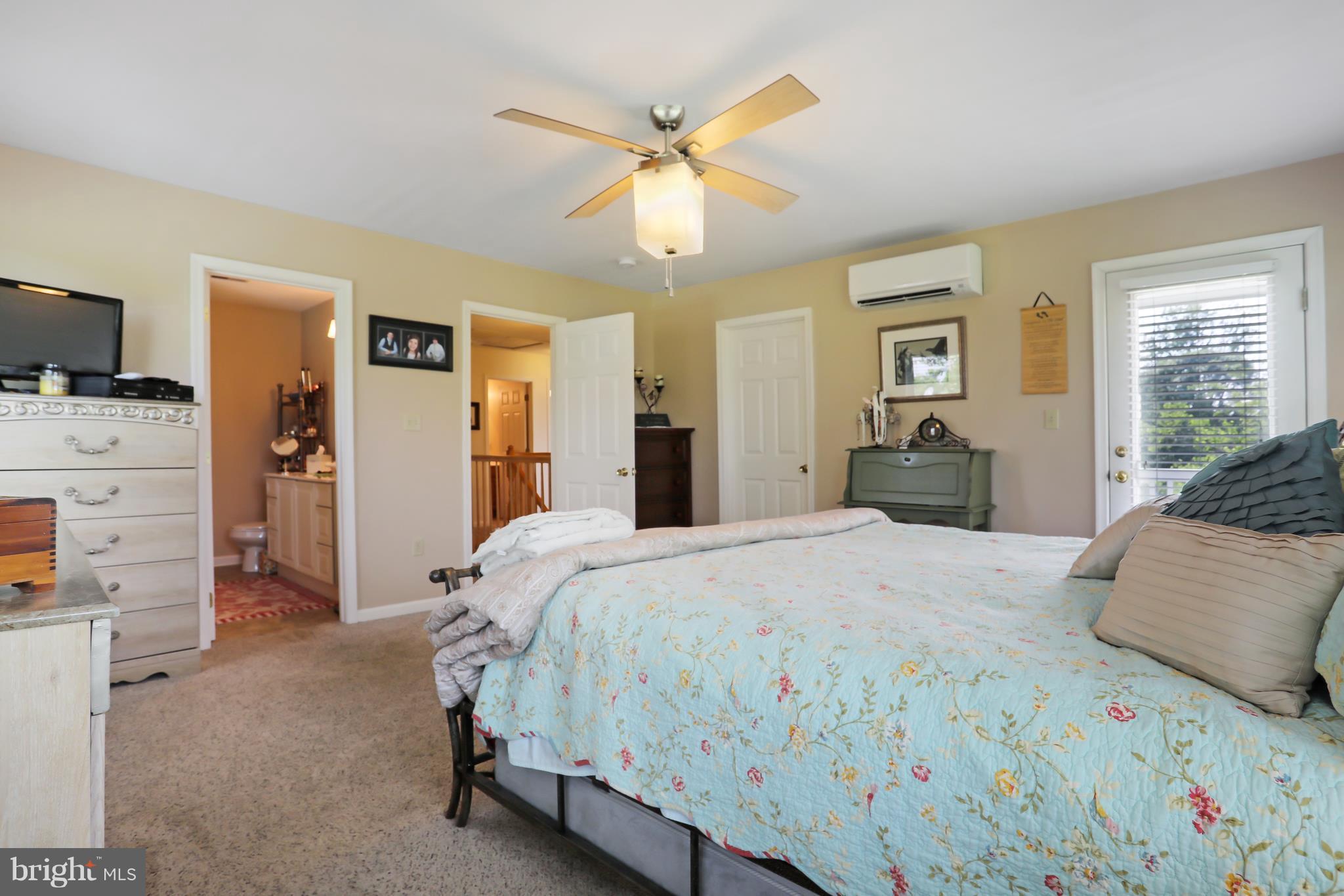 13816 Big Pool Road Clear Spring, MD 21722 - Photo 10 of 24 a bedroom with a bed and dresser