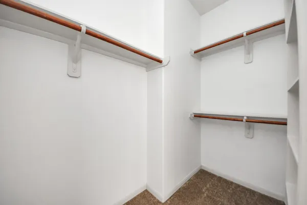 a view of a hallway with staircase