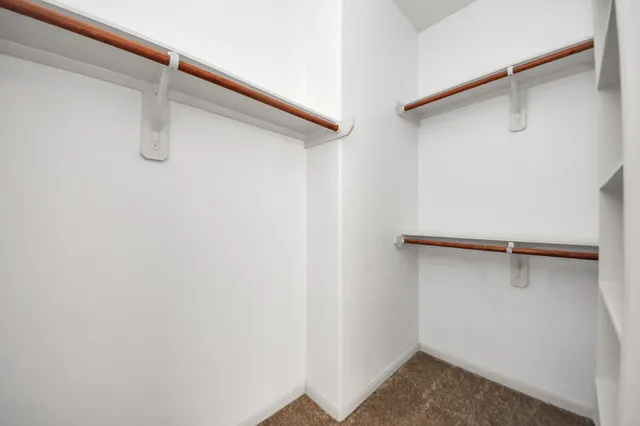 a view of a hallway with staircase