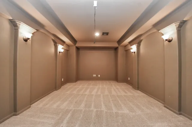 a big room with closet and mirror
