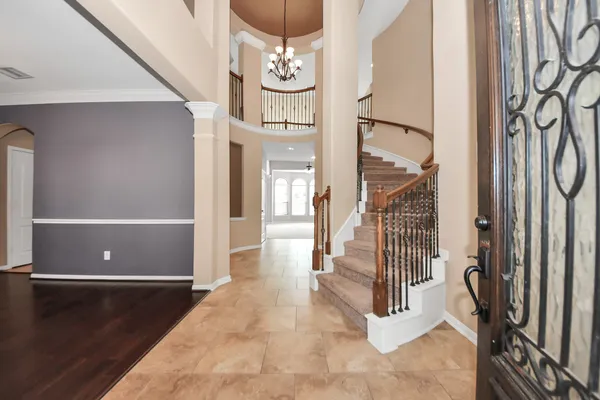a view of entryway with wooden floor