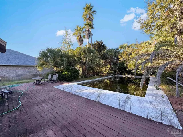 a view of swimming pool outdoor seating