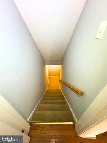 a view of a big room with wooden floor
