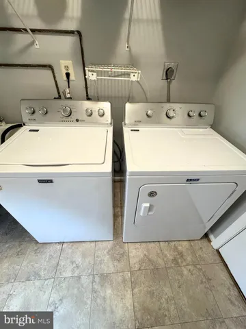 a bathroom with a sink and a window