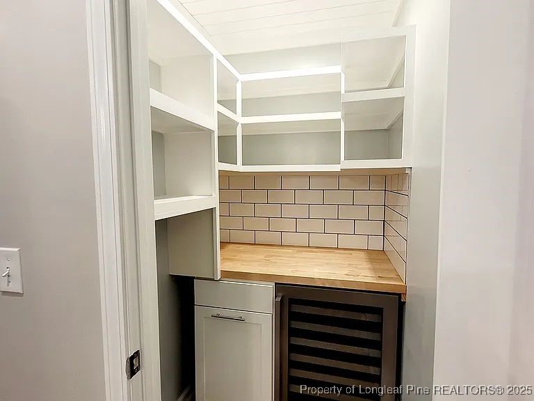 83 Kotata Avenue Bunnlevel, NC 28323 - Photo 9 of 17 a bathroom with a sink and a window