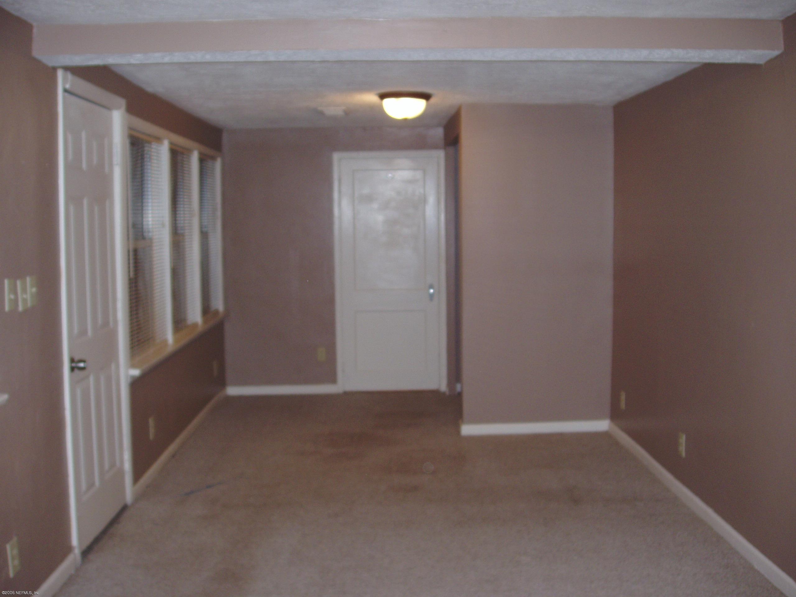 1839 Lilly Road East Jacksonville, FL 32207 - Photo 6 of 8 Master Bedroom