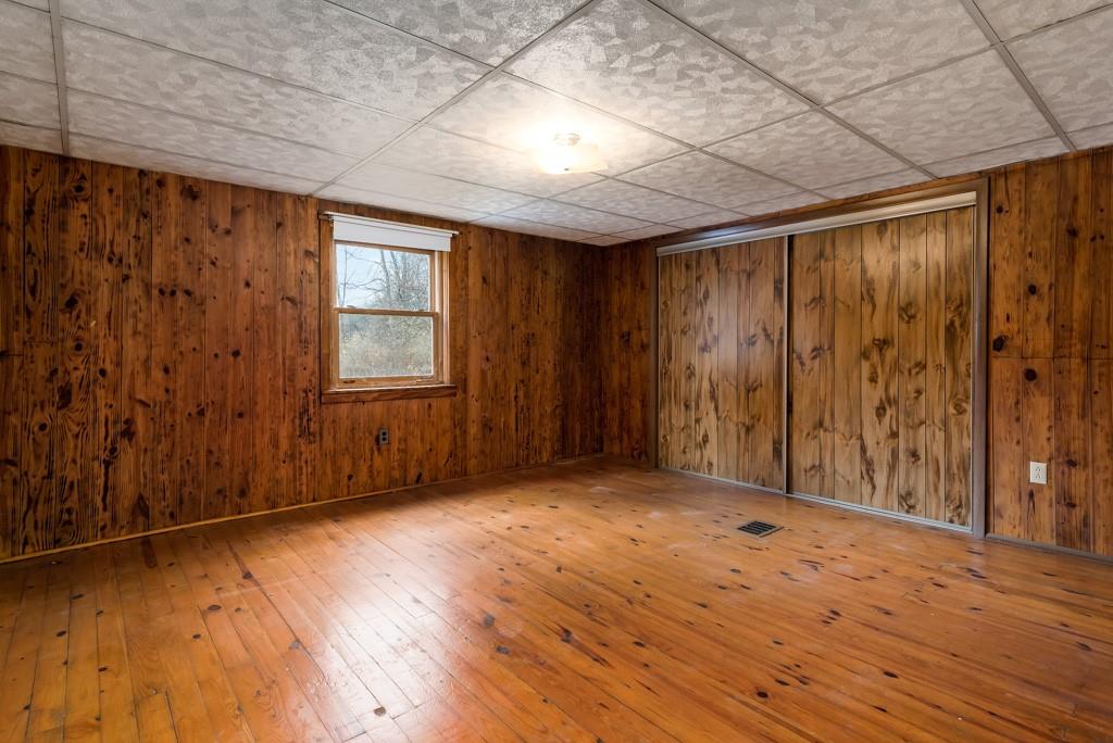 1038 Pittsburgh Road Valencia, PA 16059 - Photo 21 of 25 wooden floor in an empty room with a window