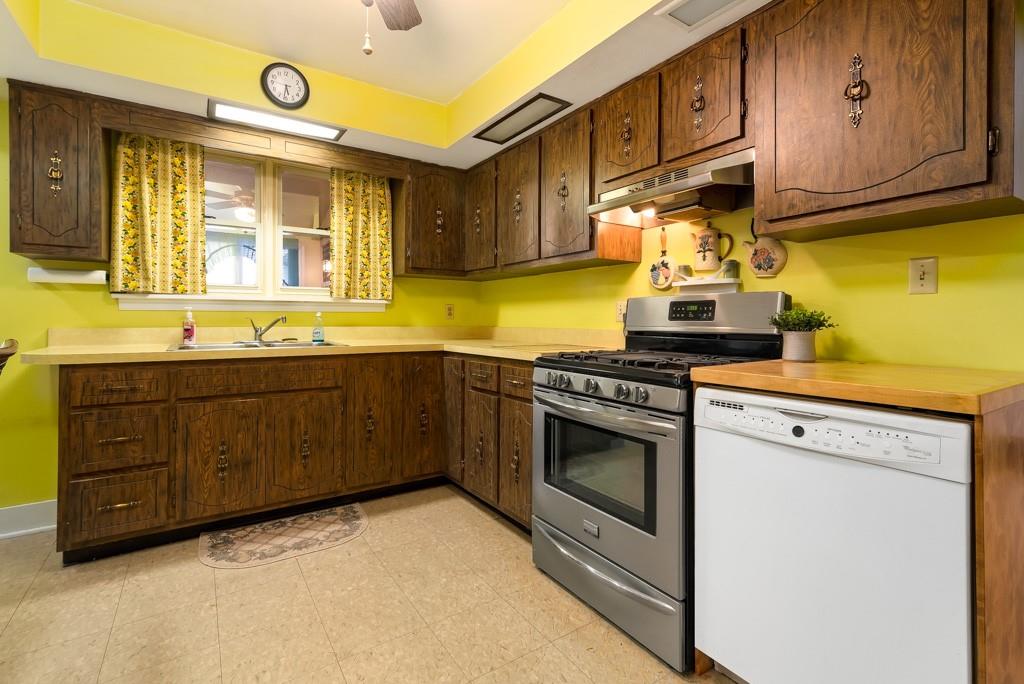 1038 Pittsburgh Road Valencia, PA 16059 - Photo 9 of 25 a kitchen with cabinets appliances and a sink