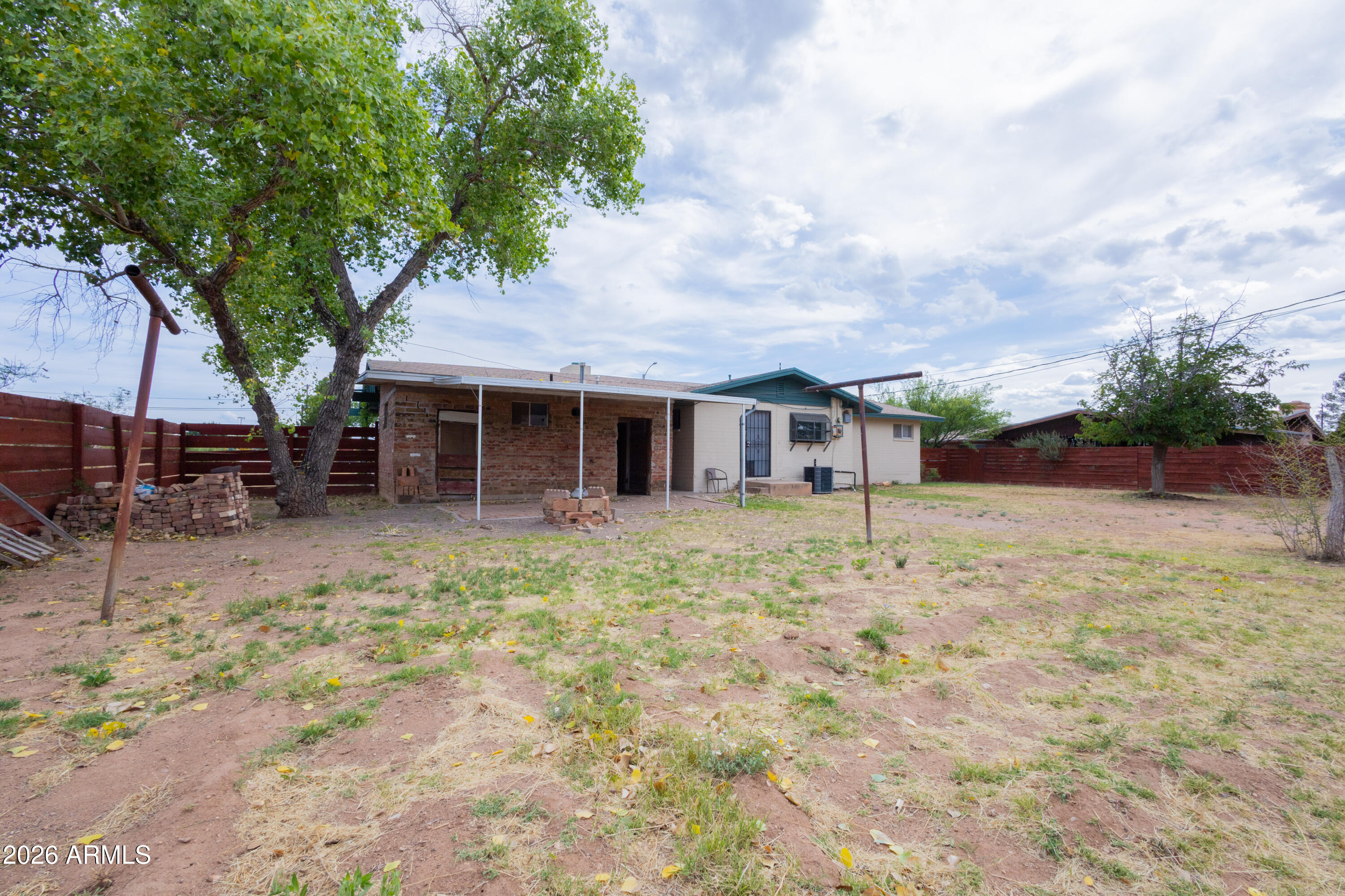 1626 11th Street Douglas, AZ 85607 - Photo 27 of 30 front view of a house with a tree
